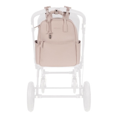 Mochila cor de rosa lisa afixada em carrinho de bebé branco