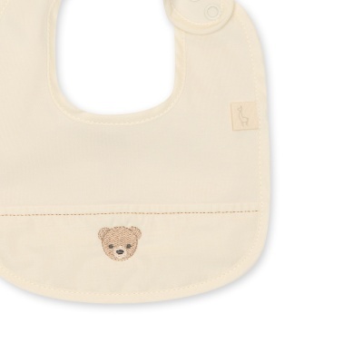 Babete de bebé cru com bordado de urso e fecho de pressão