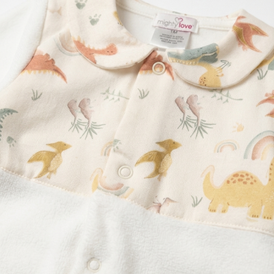Pijama branco para bebé com padrão de dinossauros e fechos metálicos