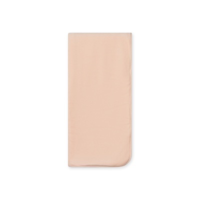Manta rectangular bege claro com bordas arredondadas e tecido liso