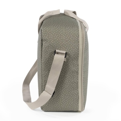 Bolsa cinzenta com padrão de pontos brancos e alça bege vista de lado