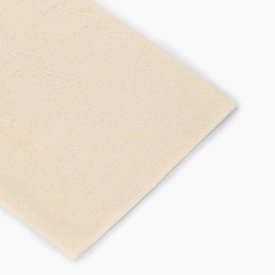 tissue ou tecido creme com padrão geométrico
