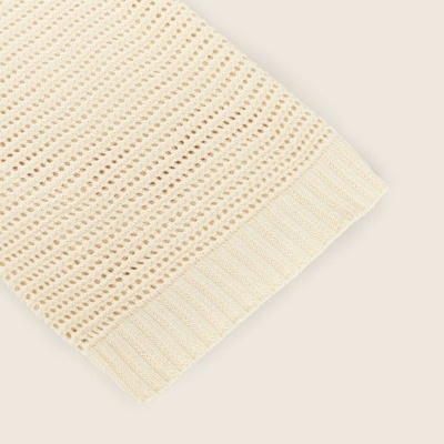 Manga creme de malha com padrão aberto e bainha canelada