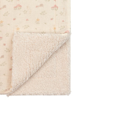 Tecido bege com padrão floral e textura felpuda creme virada para cima