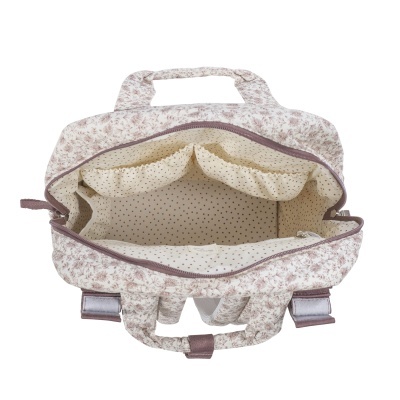 Bolsa com padrão floral exterior e interior com bolinhas castanhas