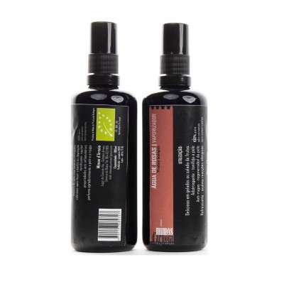 Duas embalagens pretas de spray com tampas pretas, uma com rótulo com texto e outra com código de barras