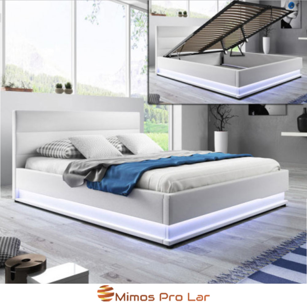Cama branca estofada com iluminação LED na base num quarto moderno