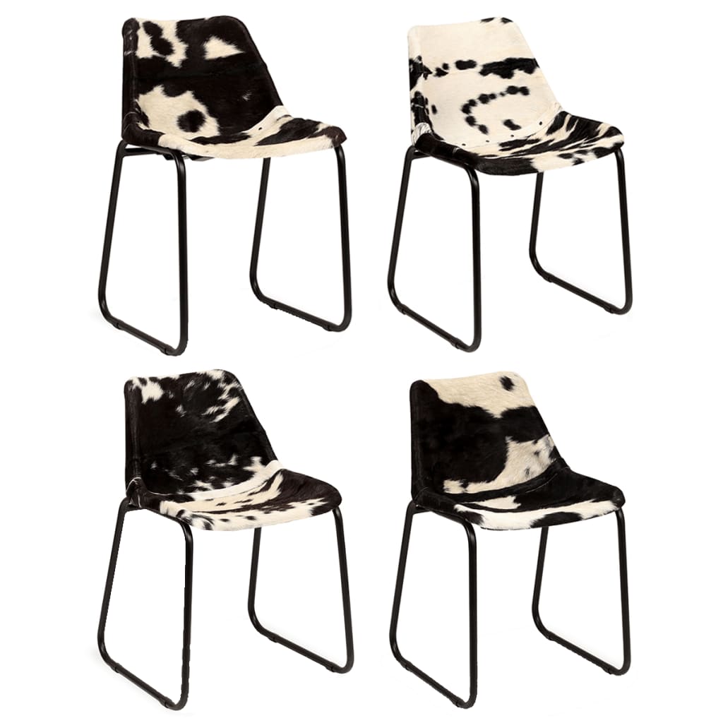Conjunto de quatro cadeiras com estofado padrão pele de vaca preto e branco e estrutura metálica preta