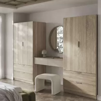 Móveis de quarto em madeira clara com armários, secretária, espelho redondo e banco estofado branco