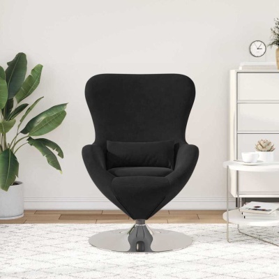 Cadeira acolchoada preta de design moderno com base metálica prateada num quarto com planta, tapete branco e móveis brancos