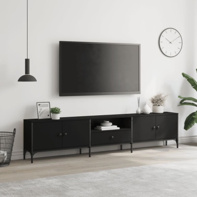 Móvel preto para sala com televisão, relógio e planta em ambiente minimalista.