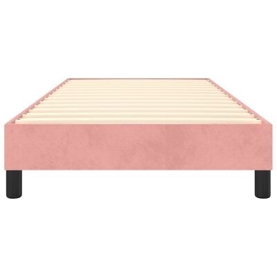 Estrutura de cama cor-de-rosa com ripas de madeira e pernas pretas