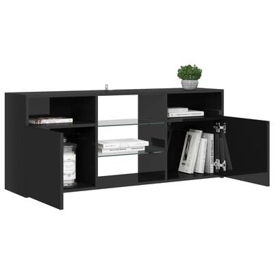 Móvel de sala de estar preto lacado com portas, prateleira de vidro, livros e planta em vaso