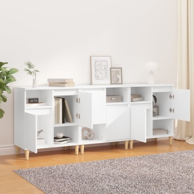 Aparador branco com portas abertas e decoração minimalista