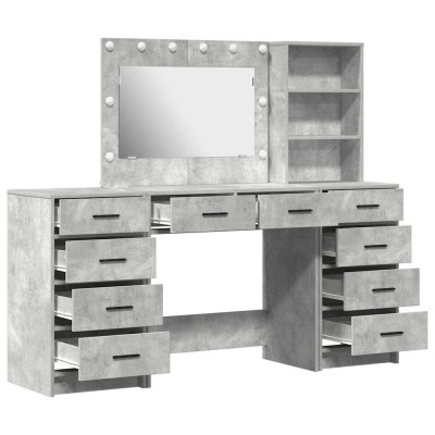 Mesa de maquilhagem cinzenta com gavetas abertas, espelho com luzes e estante aberta