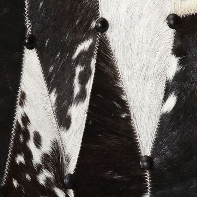 Pele preta e branca com costuras e botões pretos