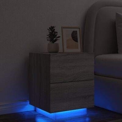Mesa de cabeceira flutuante em madeira cinzenta com luz LED azul e decoração