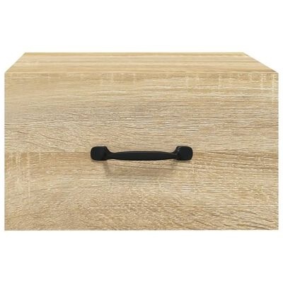 Caixa de madeira clara com puxador preto