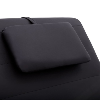 Almofada retangular preta com tira elástica sobre superfície preta