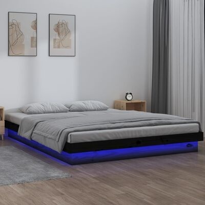 Cama moderna com iluminação LED azul e decoração minimalista