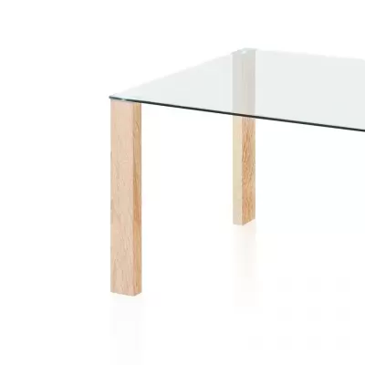 Mesa com tampo de vidro transparente e pernas em madeira clara