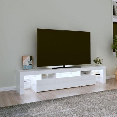 Móvel de TV branco com televisão e decoração