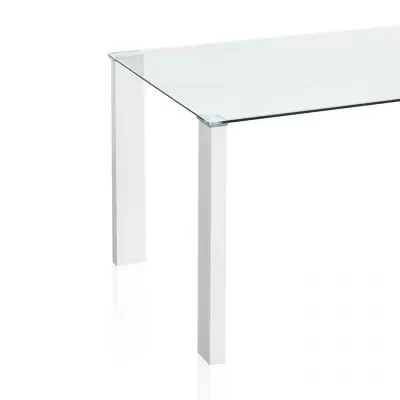 Mesa com tampo de vidro e pernas metálicas brancas
