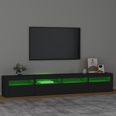 Móvel de TV preto moderno com iluminação verde interior e decoração