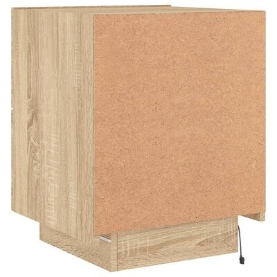 Móvel de cozinha em madeira clara com porta frontal em cortiça