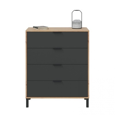 Cómoda de madeira com gavetas pretas e tampo com livro e lâmpada