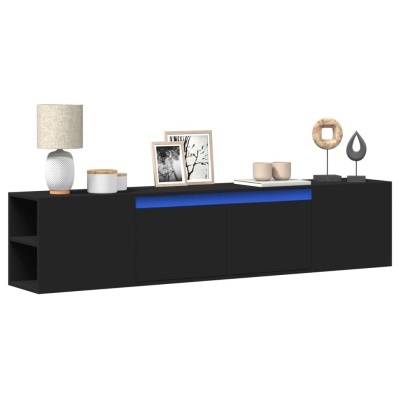 Móvel baixo preto com acessórios decorativos