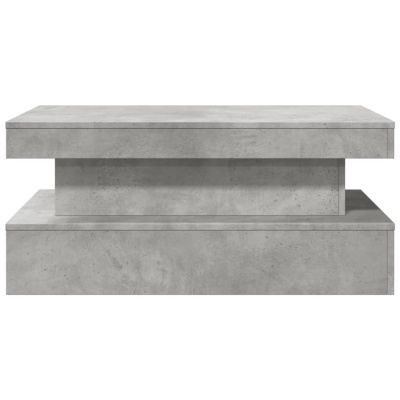 Mesa de centro moderna em betão cinzento com duas plataformas retangulares.