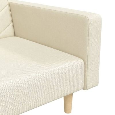 detalle sofá beige con patas de madera