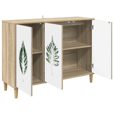 Móvel de madeira clara com portas brancas decoradas com folha verde e prateleiras no interior