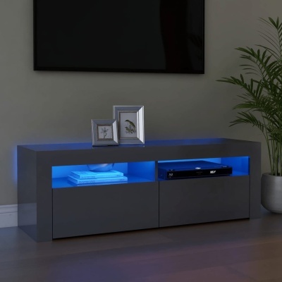 Móvel de televisão cinza com iluminação azul em prateleiras e decoração com molduras e planta