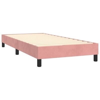 Estrado de cama rosa com lâminas de madeira e pernas pretas.