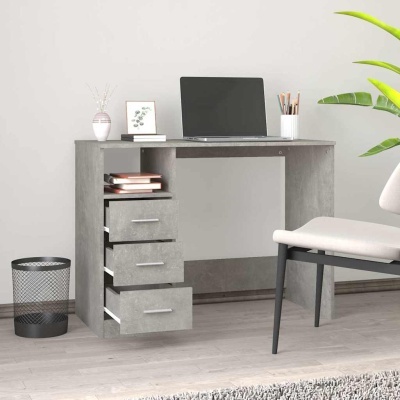 Secretária cinza com textura de cimento e três gavetas em ambiente interior moderno