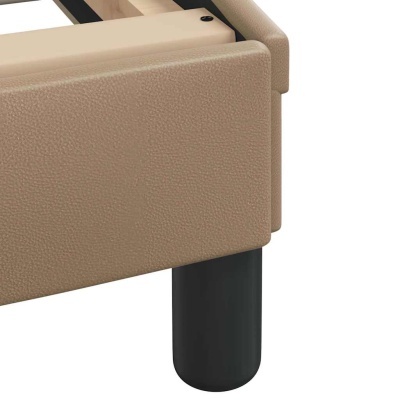 Estrutura de cama bege com perna preta cilíndrica