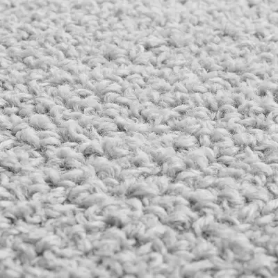 tecido texturado cinzento claro em close-up