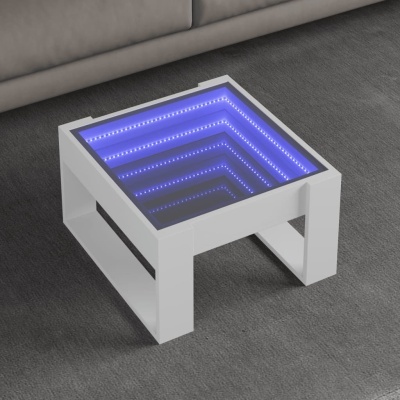 Mesa de centro branca com tampo iluminado por LED azul num tapete cinza