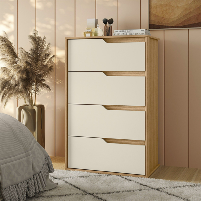 Cómoda de madeira clara com quatro gavetas brancas numa sala com parede rosa e tapete cinza