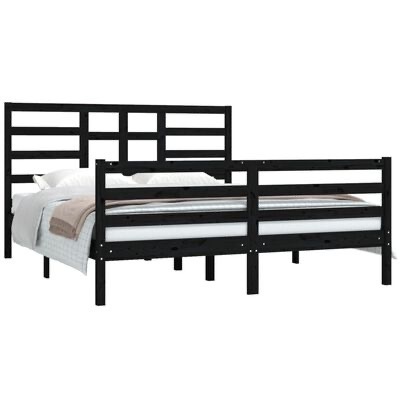 Cama de casal preta com colchão branco e roupa de cama cinza e bege