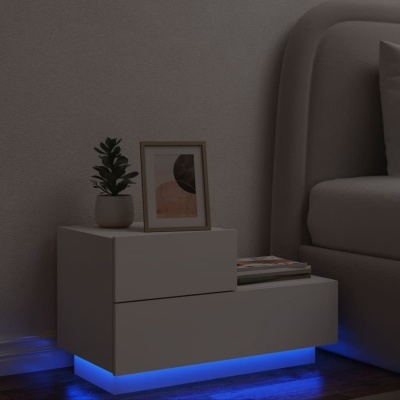 Mesa de cabeceira branca moderna com iluminação LED azul na base ao lado de cama cinzenta