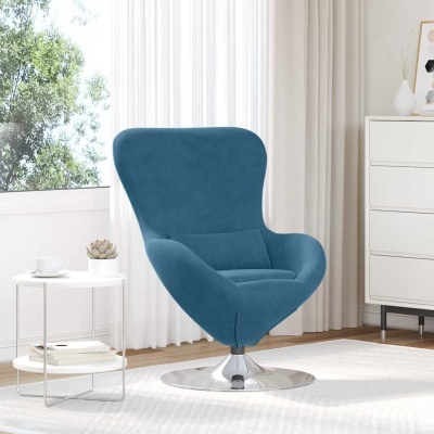 Cadeira azul com base metálica ao lado de mesa branca com chávena e planta