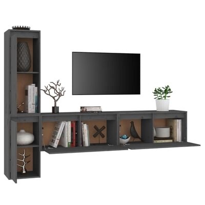 Móvel de sala cinzento para TV com estante vertical e painel horizontal com portas rebatíveis, decorado com livros e plantas.