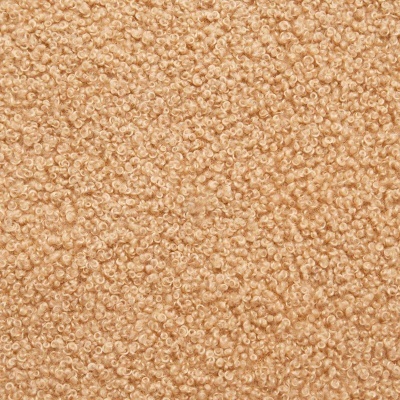 Textura de tecido bege com pequenos cachos em close-up