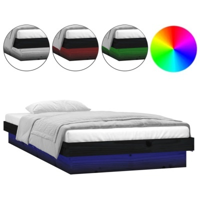 Cama individual preta com iluminação LED colorida na base e roupa de cama branca