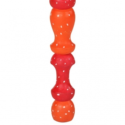 Objeto decorativo cerâmico laranja e vermelho com pontos brancos