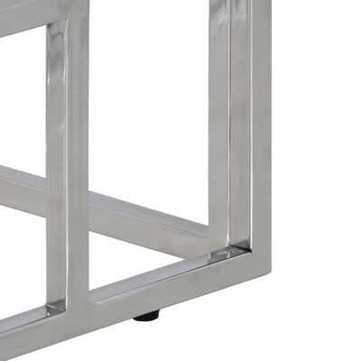 Estrutura metálica prateada com acabamento polido e pés pretos