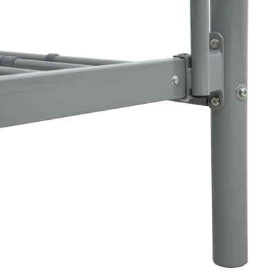 Pé e estrutura de cama em metal cinza com parafusos